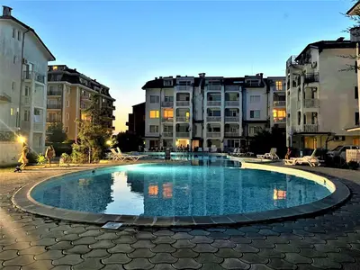 a swimming pool in the middle of a building at Bravo 5 Holiday Home in Sunny Beach