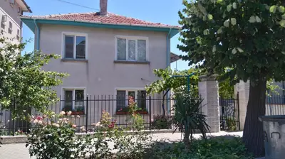a house with a fence in front of it at Песента на морето in Obzor