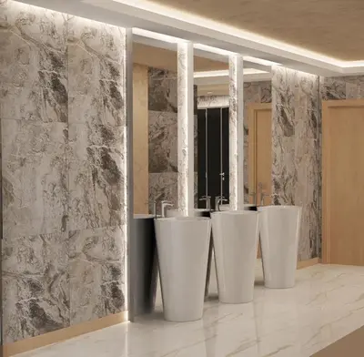 a row of white toilets in a room at Hotel Golden Dune in Sunny Beach
