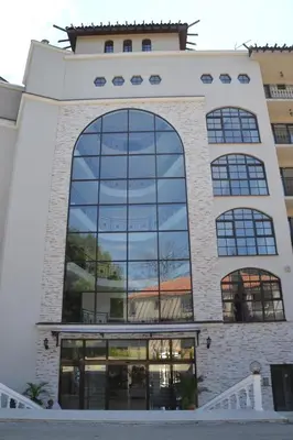 an office building with a large window at Apartment on the Cliff Obzor in Obzor