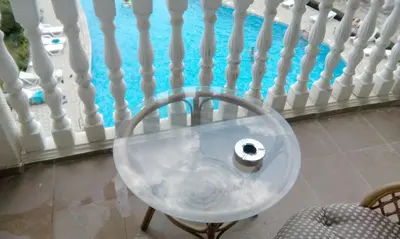 a glass table with a roll of toilet paper on it at Bravo 5 Sunny Beach in Sunny Beach