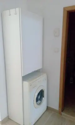a white washer and dryer in a room at Bravo 5 Sunny Beach in Sunny Beach