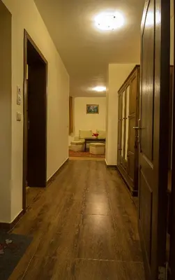 an empty hallway with a living room with a couch at к-г Луна к-с Лонгоза комплекс Лонгоза in Byala