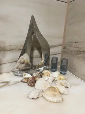 a group of shells on a table next to a stove at De Luxe Studio Burgas, City Center in Burgas City