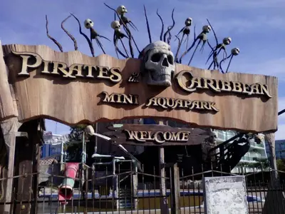 a sign with a skull and skeletons on it at Sanny view South- Студия Мир авангарда in Sunny Beach