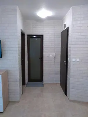 an empty hallway with two doors in a room at Villa Gracia in Ravda
