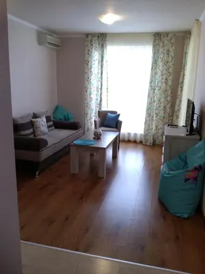 a living room with a couch and a table at Villa Gracia in Ravda