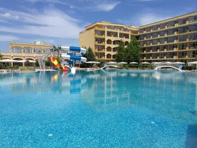 a large swimming pool in front of a hotel at AKB Apartment Sea View in Aheloy