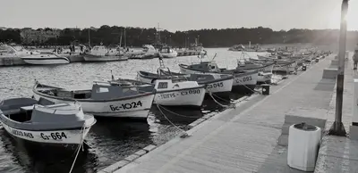 a bunch of boats are docked in the water at Morning Star Deluxe in Chernomorets