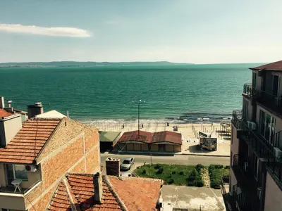 a view of the ocean from a building at Apartment Martin Beach in Pomorie