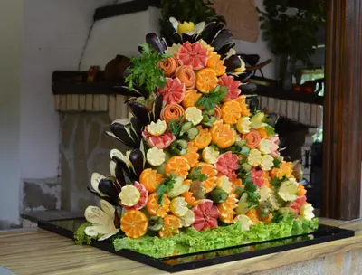 a large display of fruit and vegetables on a table at Arkutino Family Resort in Sozopol