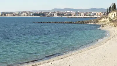 a beach with a city in the background at Akrotiria Beach Apart Complex in Nesebar