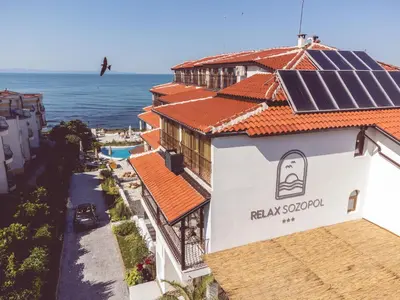 a group of buildings with solar panels on the roof at Relax Sozopol in Sozopol