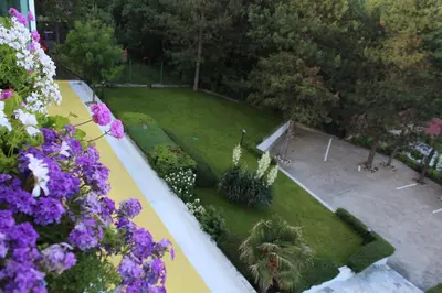 an aerial view of a garden with purple flowers at Hotel Zora in Sunny Beach