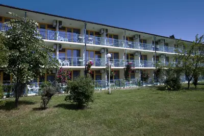 a large building with balconies and flowers on it at Continental Park Hotel in Sunny Beach