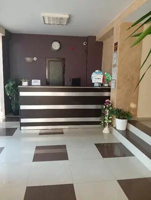 a lobby with a reception desk in a building at ,,Дироси'' in Sveti Vlas