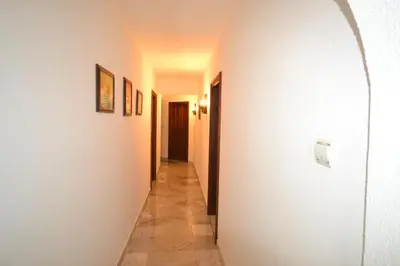 a corridor of a hallway with at More Family Hotel in Sozopol