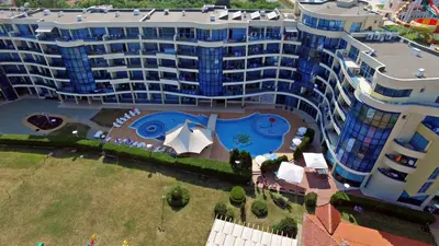 an aerial view of a large building with a pool at Aparthotel Marina Holiday Club - All Inclusive & Free Parking in Pomorie