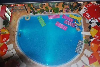 an overhead view of a swimming pool with toys around it at Italia Hotel in Nesebar