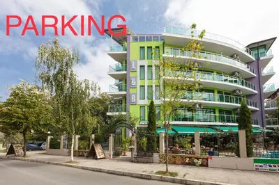 a building with the word parking written on it at Hotel L&B- Free parking in Sunny Beach