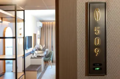 a elevator sign in a hotel room at Marieta Palace Hotel in Nesebar