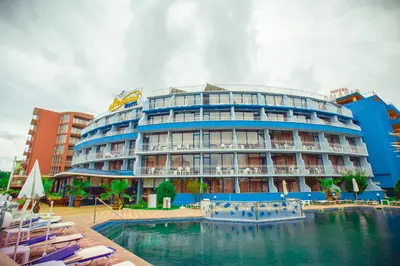 a hotel with a pool in front of a building at Hotel Bohemi in Sunny Beach