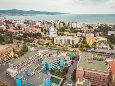 an aerial view of a city with the ocean at Hotel Bohemi in Sunny Beach