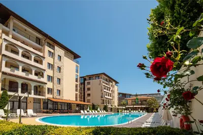 a swimming pool in front of some buildings at Apartment Tourist Complex Rose Village in Sunny Beach