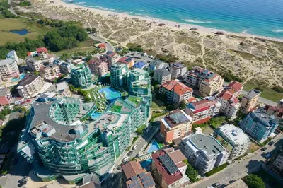 an aerial view of a resort near the beach at Hotel Primorsko Del Sol in Primorsko