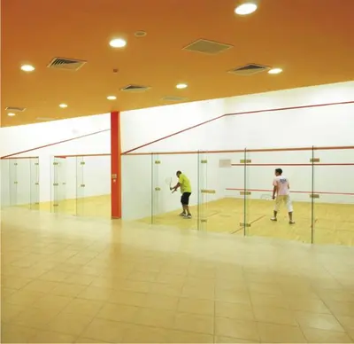two men playing a game of volley ball in a gym at Marina Cape Vacation Complex in Ravda