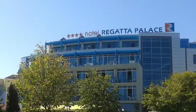 a building with a sign on top of it at Regata Palace Hotel in Sunny Beach