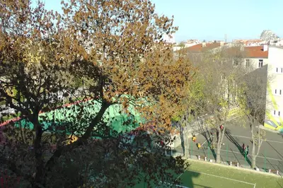 an overhead view of a park with a tree at TOP CENTER , MODERN AND QUIET APARTMENT in Burgas City