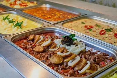 a tray of food with different types of food at Karolina Hotel in Sunny Beach