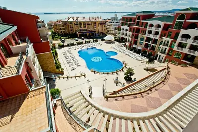 an overhead view of a pool in a city with buildings at Saint George Palace Hotel All-inclusive in Sveti Vlas