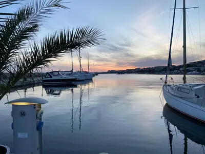 a group of boats are docked in a harbor at Dolce Vita Apartment in Sveti Vlas