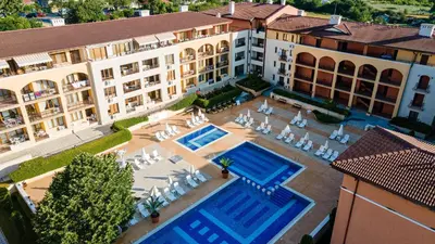 an overhead view of a building with two swimming pools at Galeria Holiday Apartments in Obzor