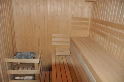 an empty sauna with two bunk beds in it at Villa on the Black Sea in Sunny Beach