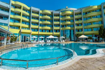 a large swimming pool in front of a hotel at MPM Hotel Arsena - Ultra All Inclusive in Nesebar