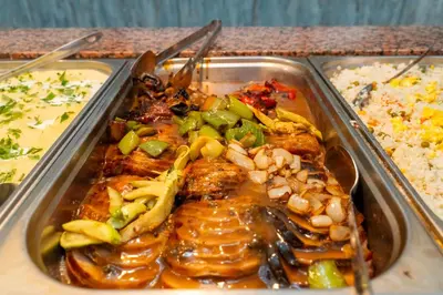 a metal tray of food at MPM Astoria Hotel - Ultra All Inclusive in Sunny Beach