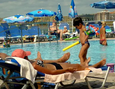 a group of people in the water at a pool at Relax studio by the sea, Bulgaria,Nesebar,Aheloy in Aheloy