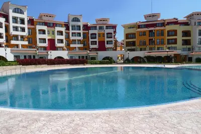 a large swimming pool in front of some buildings at Relax studio by the sea, Bulgaria,Nesebar,Aheloy in Aheloy