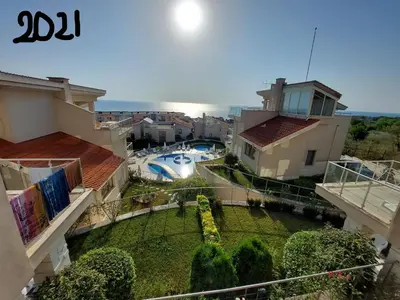 an aerial view of a house with a swimming pool at Fantastic Sea View Sun village Byala in Byala