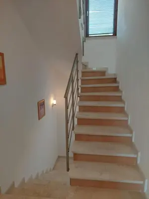 a staircase in a house with a window at Fantastic Sea View Sun village Byala in Byala