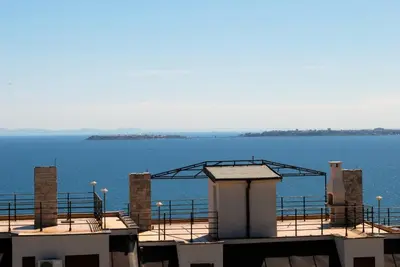 a view of the ocean from the roof of a building at Hotel Saint Tatyana in Sveti Vlas