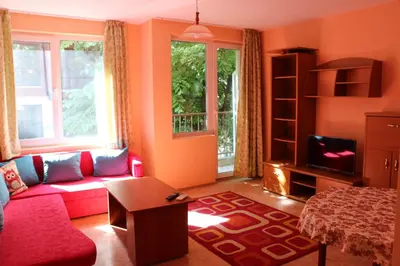 a living room with a couch and a tv at CITY STAY in Varna in Varna City