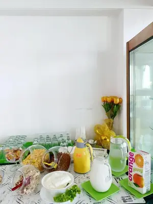 a counter top with food and drinks on it at Peter Hotel in Ravda
