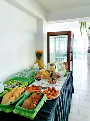 a table with a buffet of food on it at Peter Hotel in Ravda