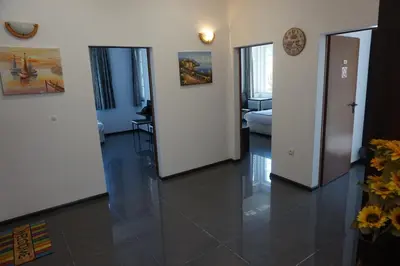 a room with a hallway with a living room at SeaSide Guest Rooms in Burgas City