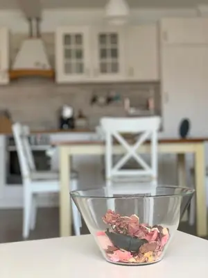 a bowl of food sitting on a table in a kitchen at Charming Beach Holiday Apartment in Lozenets
