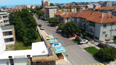 an aerial view of a city street with buildings at Aura in Primorsko